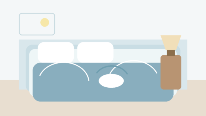 Illustration neutre d’une chambre avec coussins de soutien pour une hanche sensible